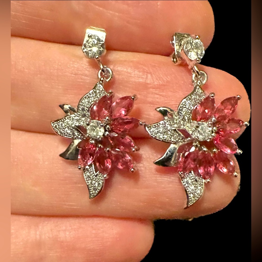 Beautiful dainty small floral cubic zirconia dangle earrings. Rhodolite color